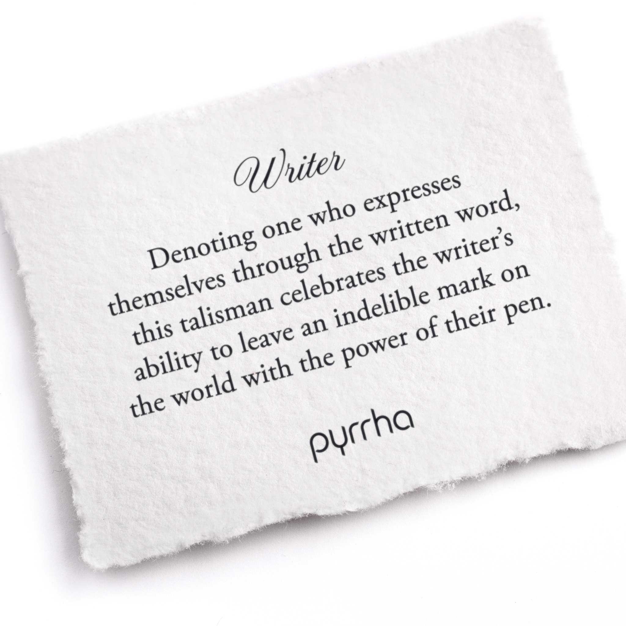 A hand-torn, letterpress printed card describing the meaning for Pyrrha's Writer Talisman