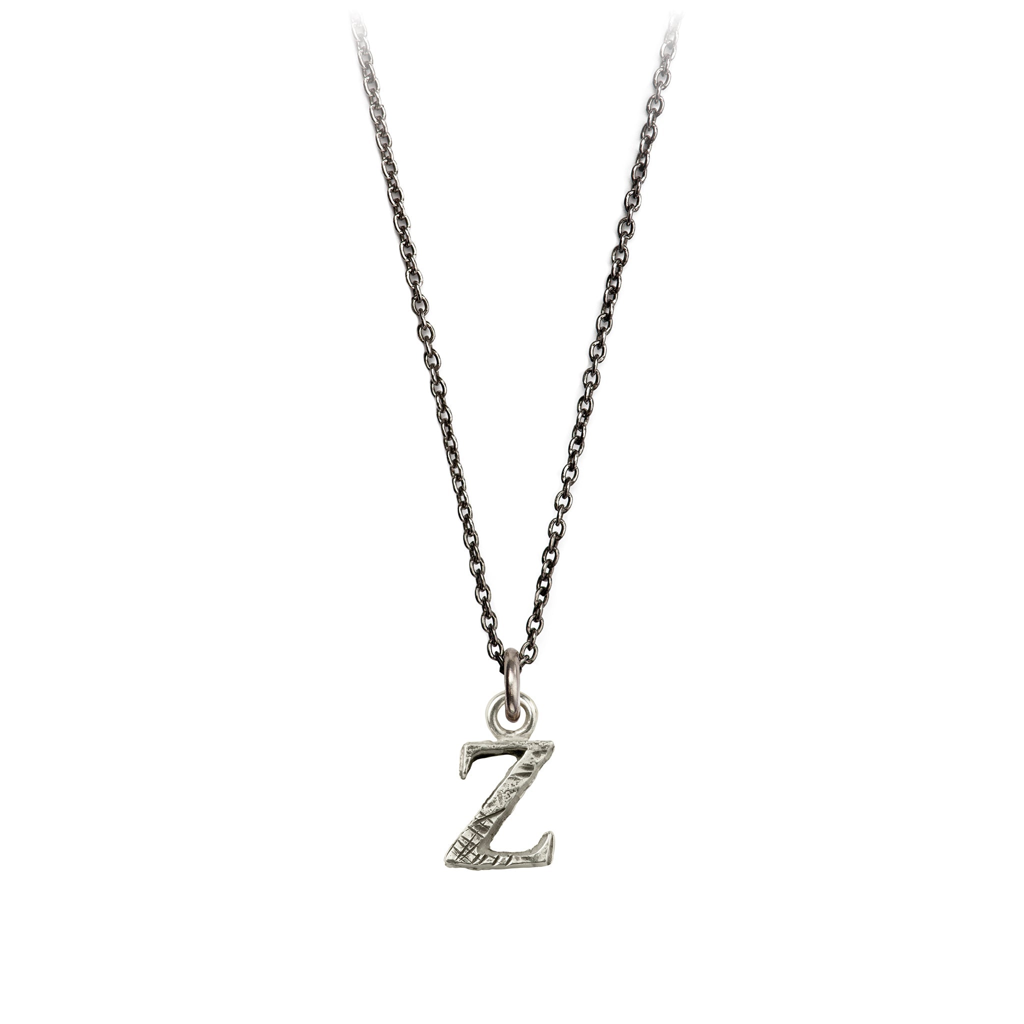 A sterling silver letter "Z" charm on a silver chain.