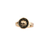 A 14k gold ring with our What Once Was talisman on the band.