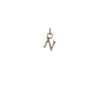 A 14k gold charm in the shape of the letter "N".