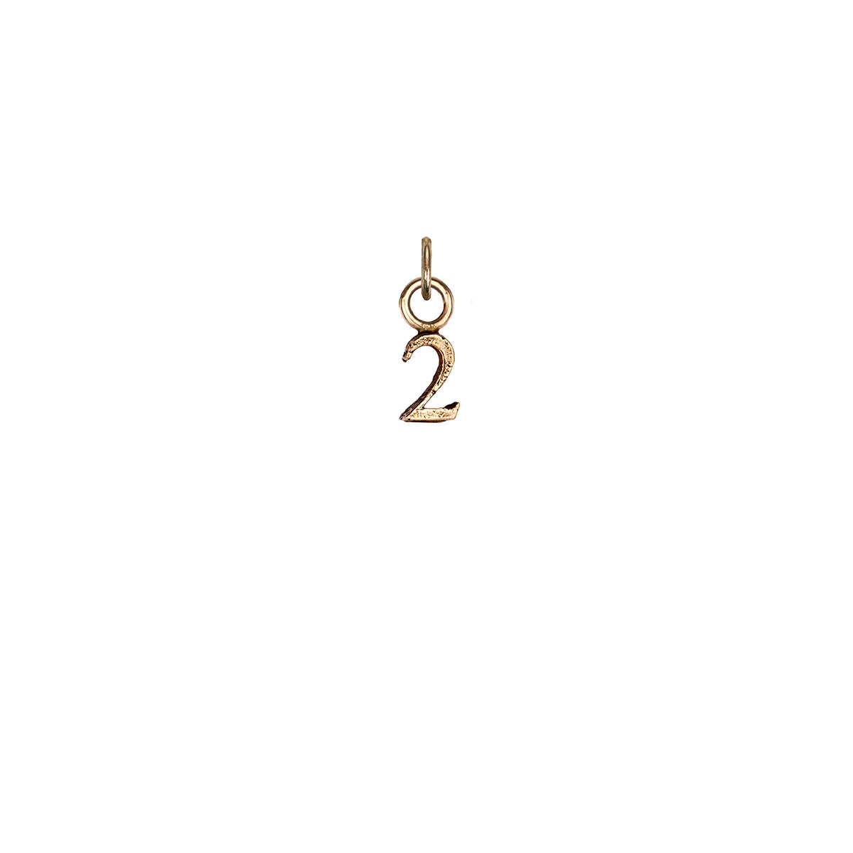 A 14k gold charm in the shape of the number two.