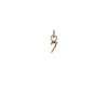 A 14k gold charm in the shape of the number seven.