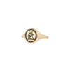 A 14 karat gold ring with our Unicorn signet pictured on the top.