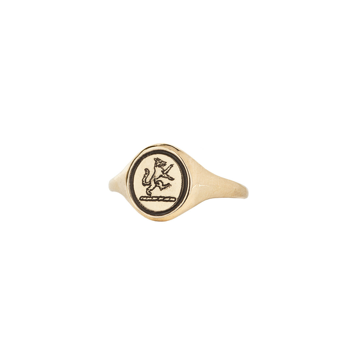 A 14 karat gold ring with our Wolf signet pictured on the top.