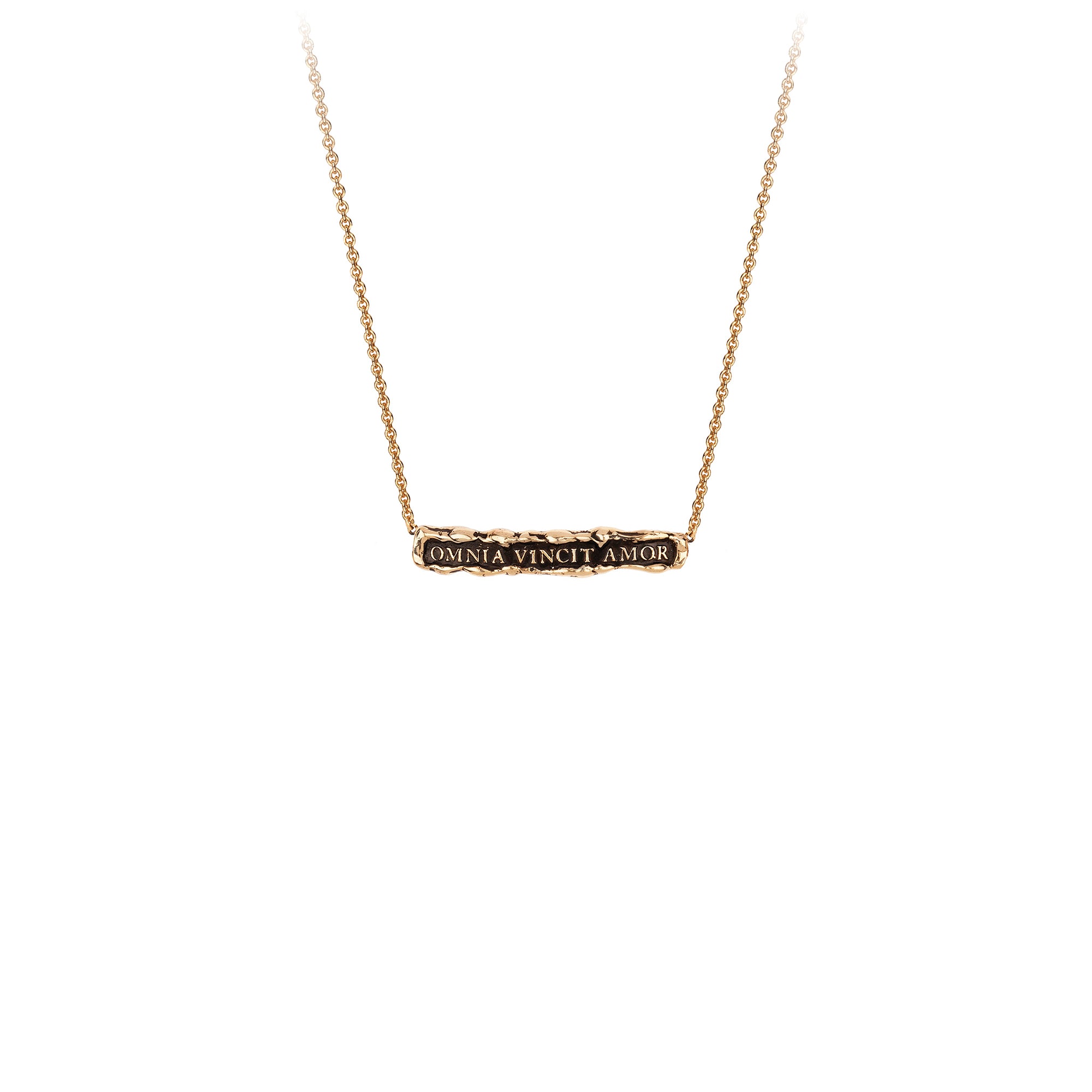 A 14k gold chain featuring a gold bar with our Omnia Vincit Amor engraving.