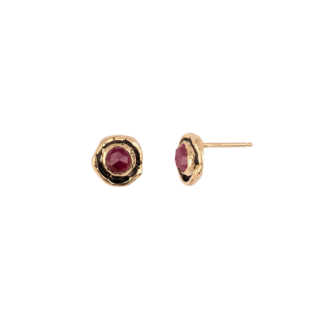 A set of 14k gold stud earrings featuring small rubies.