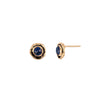 A set of 14k gold stud earrings featuring small sapphires.