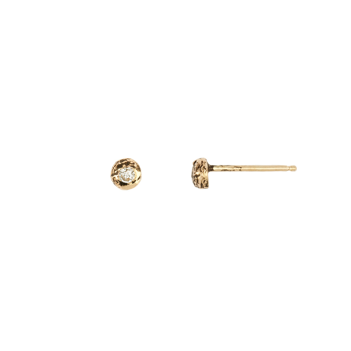 A set of 14k gold stud earrings set with a white diamond.
