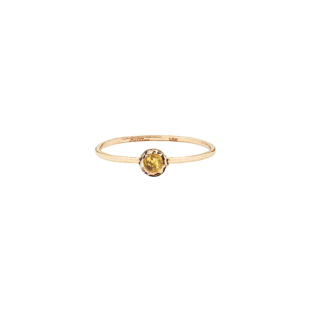 A 14k gold ring featuring a gold set yellow sapphire.