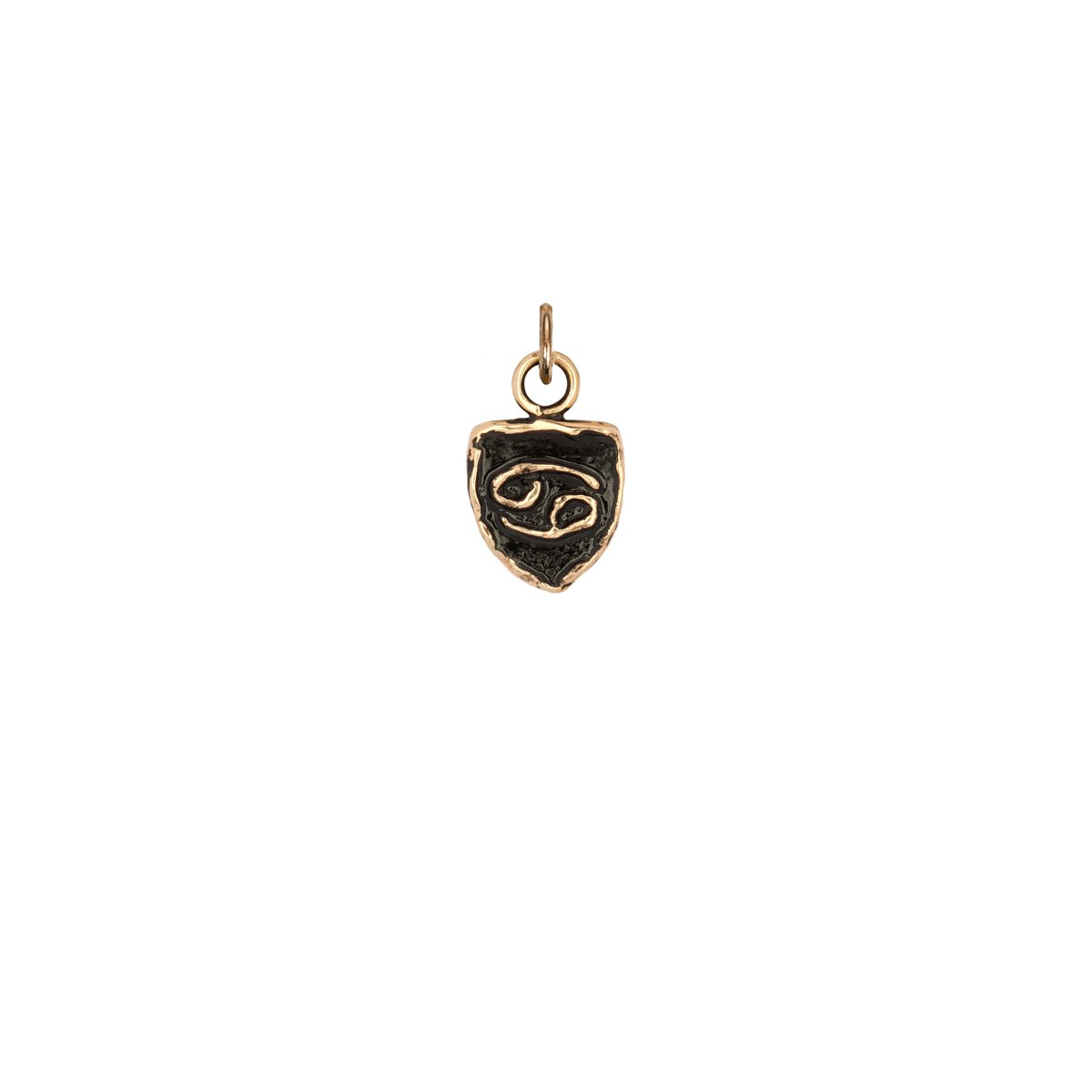 A 14k gold Cancer zodiac talisman.