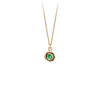 A 14k gold chain featuring a small 14k gold faceted emerald.