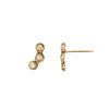 A set of 14k gold stud earrings set with three white diamonds.
