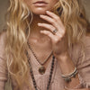 A model wearing our silver narrow triple band ring