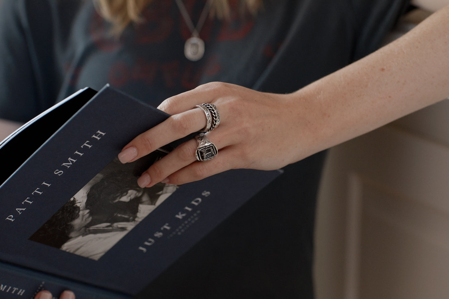 A model wearing our silver memento mori band ring