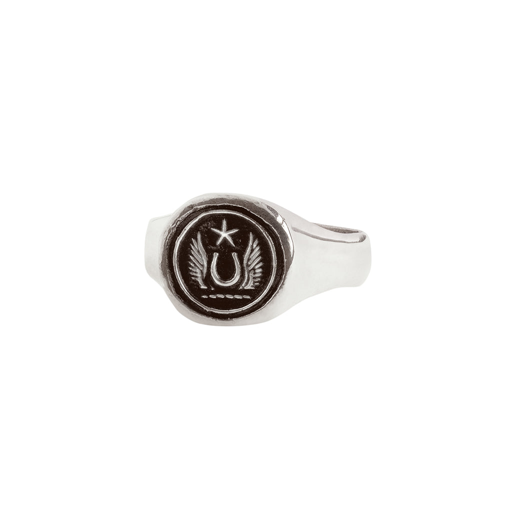 A sterling silver signet ring with our silver Luck and Protection talisman.