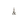 A sterling silver Ampersand charm.