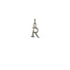 A sterling silver letter "R" charm.