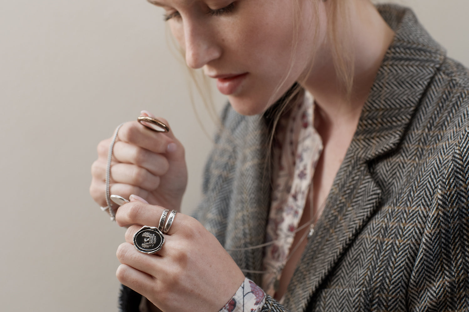 A model wearing our sterling silver Fire Within ring on her finger.