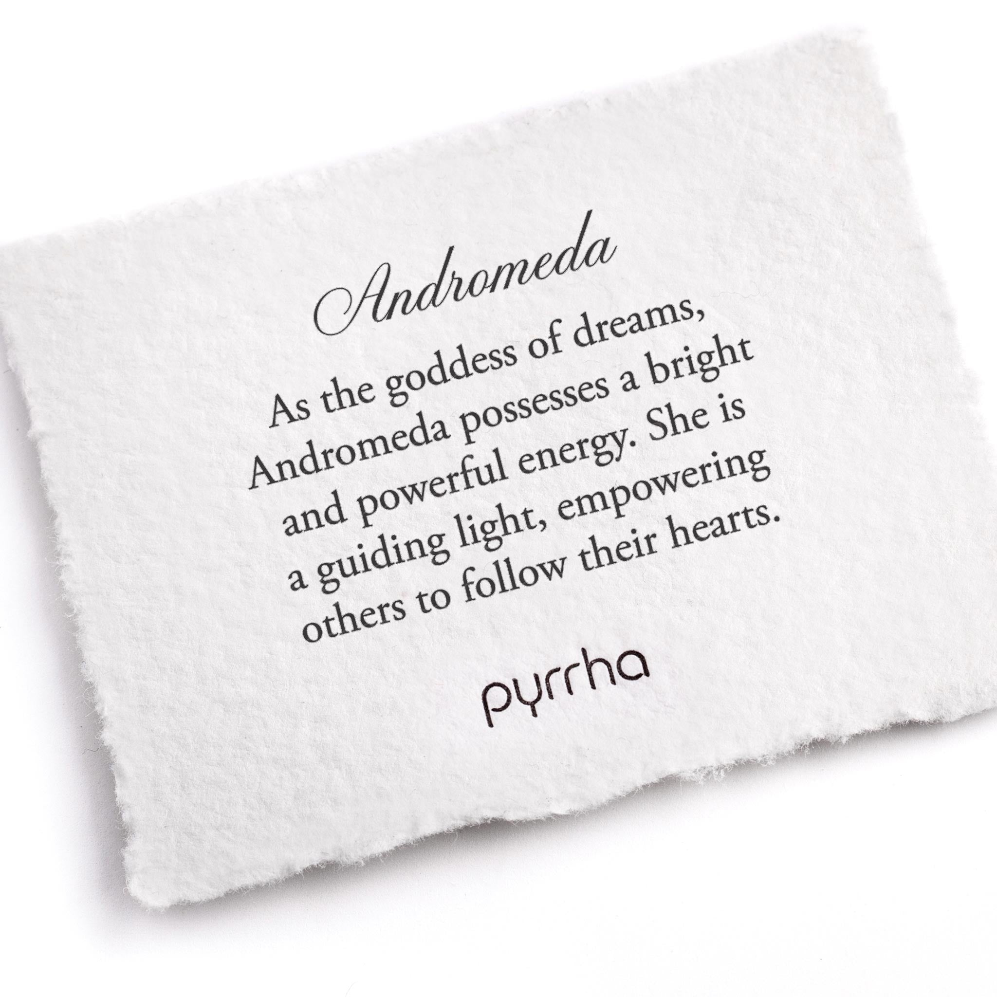 A hand-torn, letterpress printed card describing the meaning for Pyrrha's Andromeda Goddess Talisman