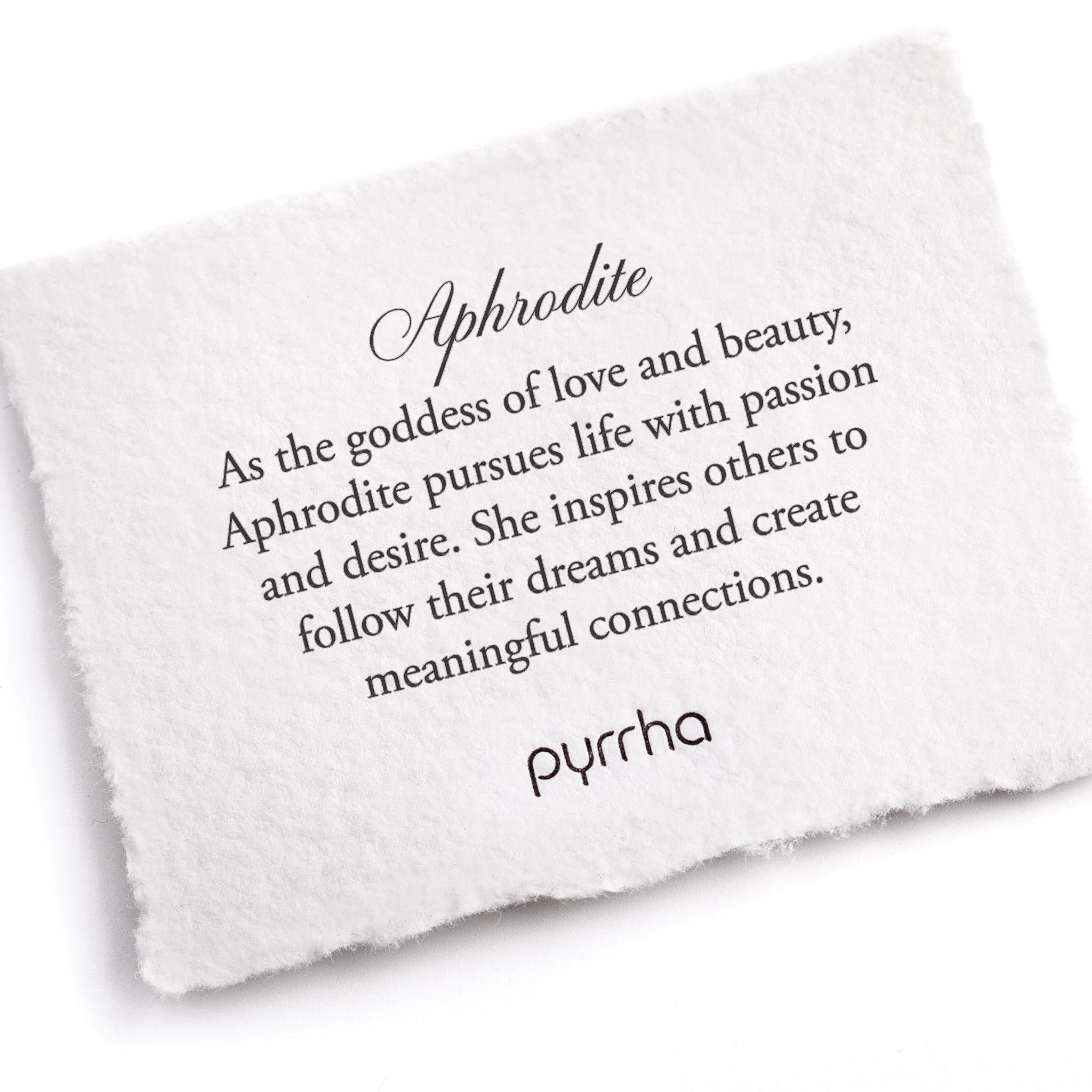 A hand-torn, letterpress printed card describing the meaning for Pyrrha's Aphrodite Goddess Talisman