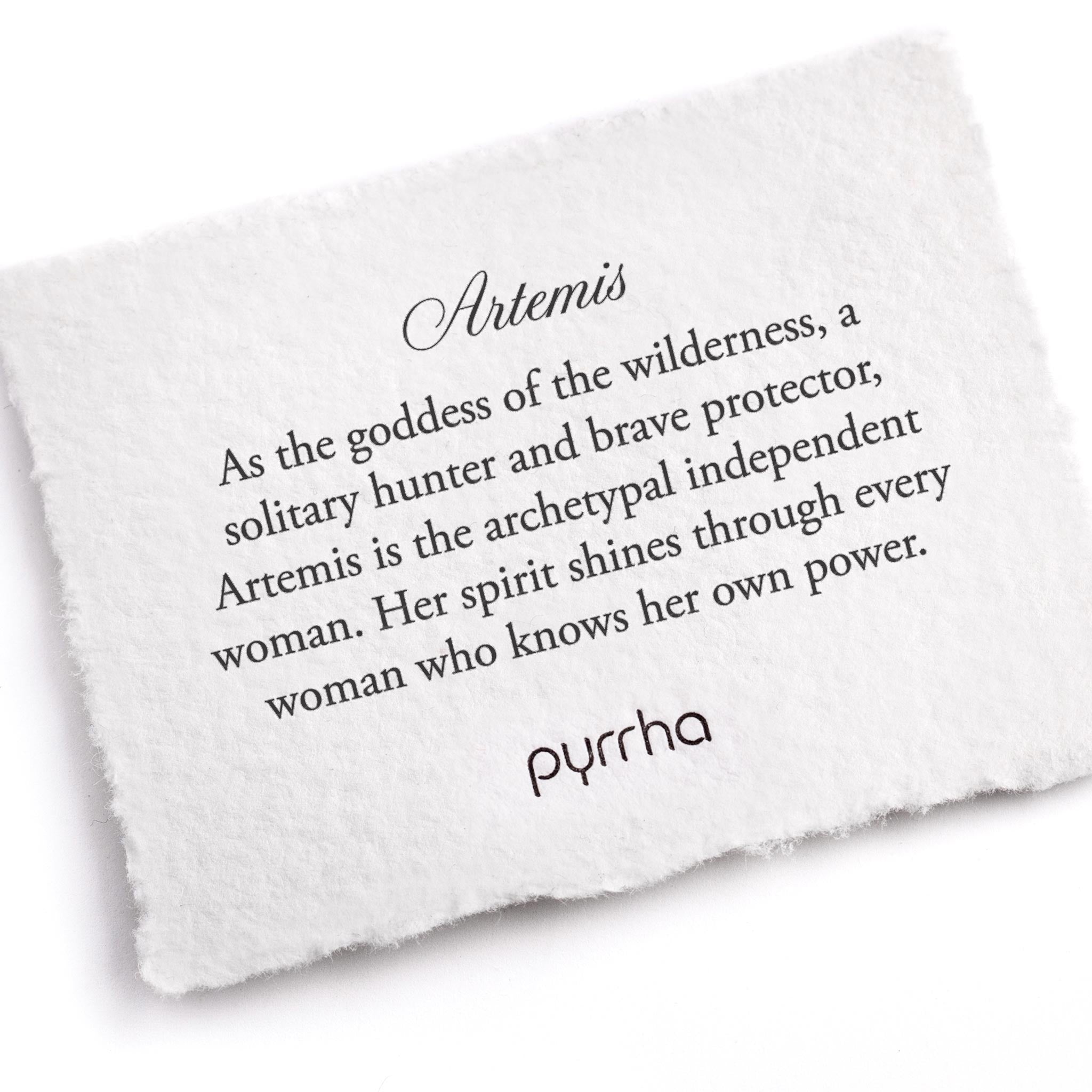 A hand-torn, letterpress printed card describing the meaning for Pyrrha's Artemis Goddess Talisman