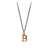 A bronze "B" charm on a blackened sterling silver chain.