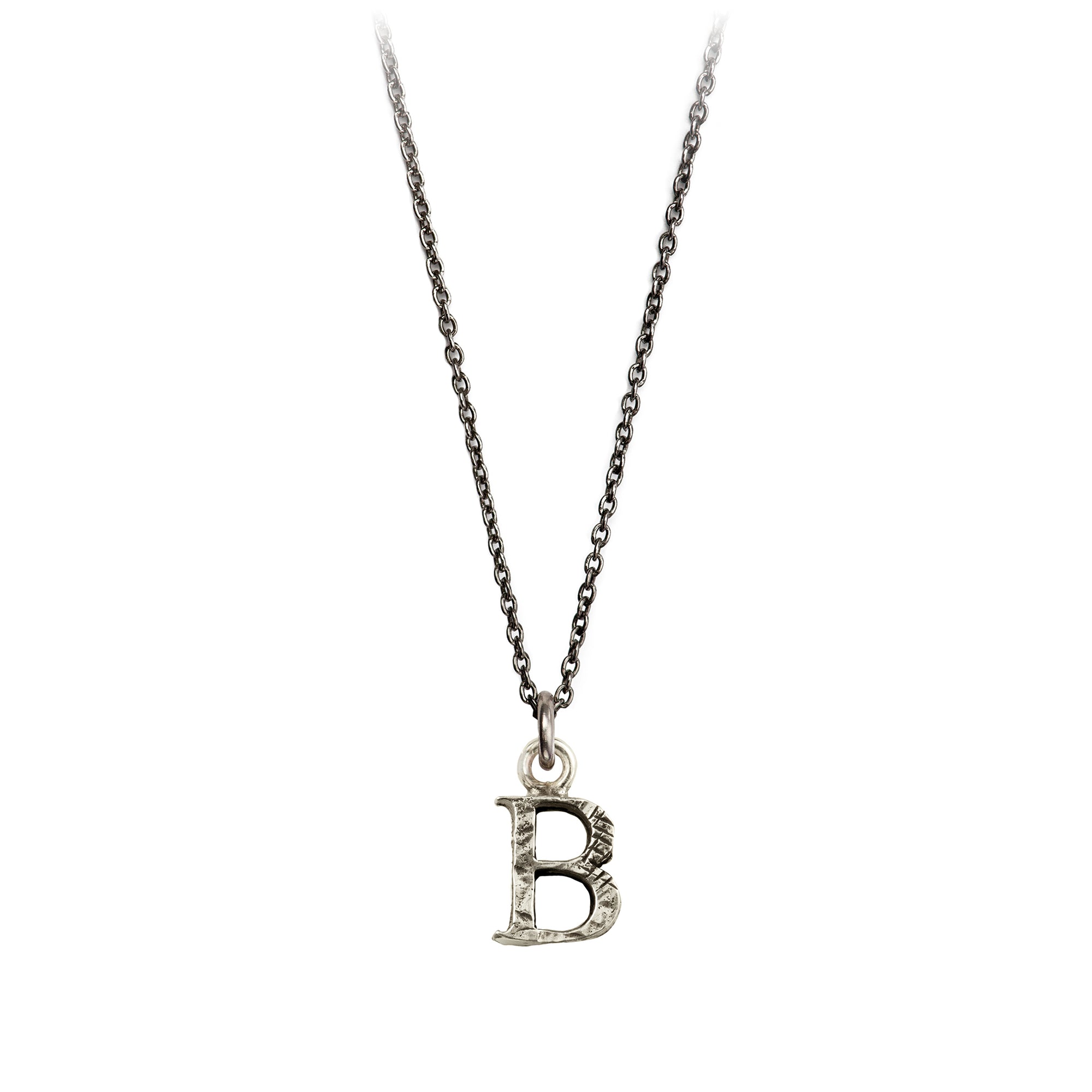 A sterling silver letter "B" charm on a silver chain.