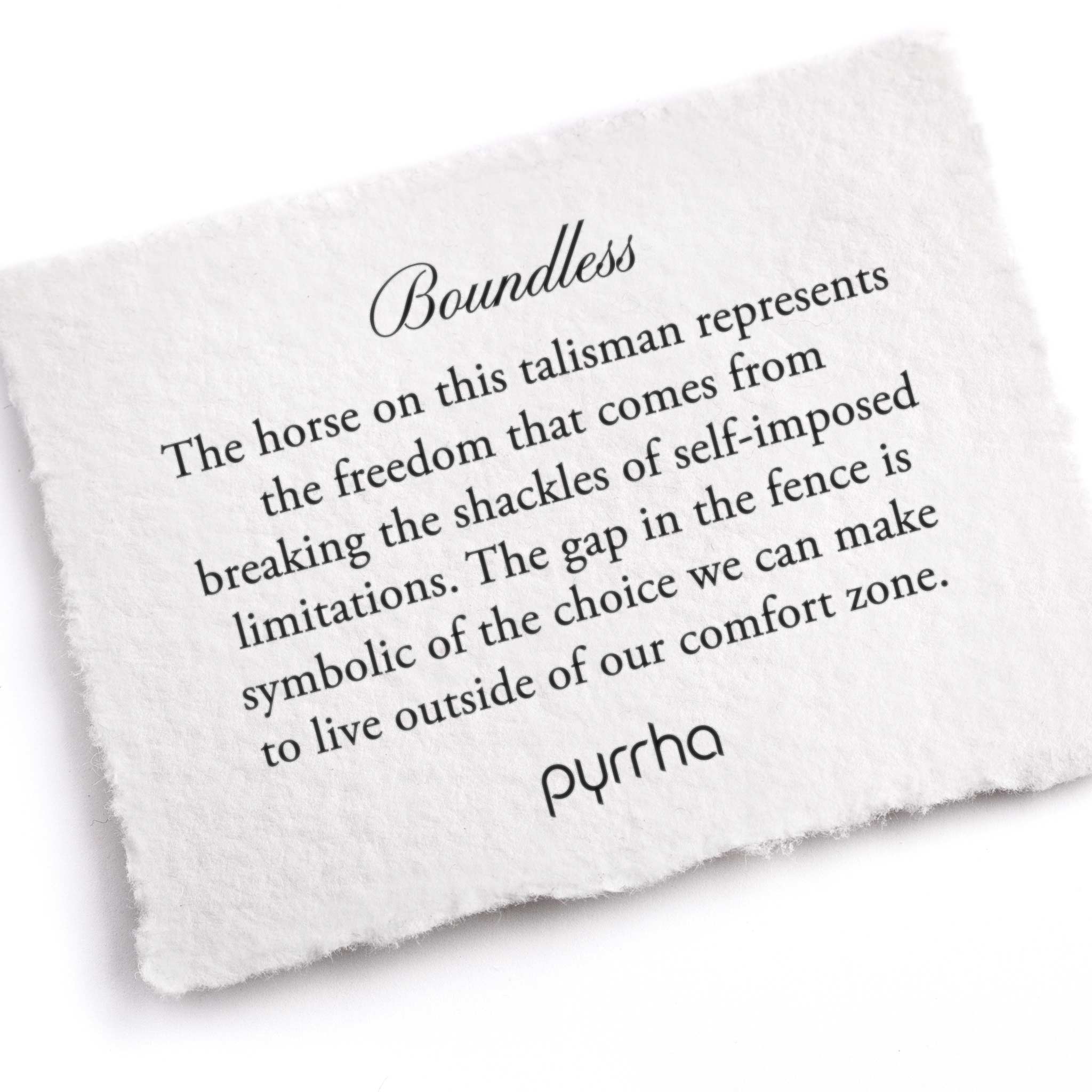 A hand-torn, letterpress printed card describing the meaning for Pyrrha's Boundless Talisman