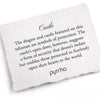 A hand-torn, letterpress printed card describing the meaning for Pyrrha's Castle 14K Gold Signature Talisman