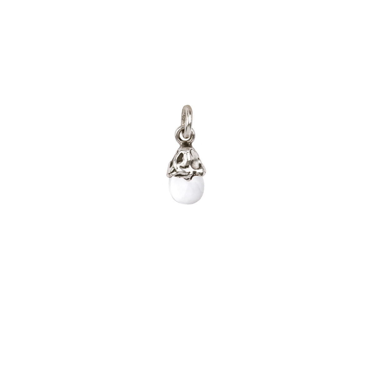 A sterling silver attraction charm capped with a clear quartz stone.