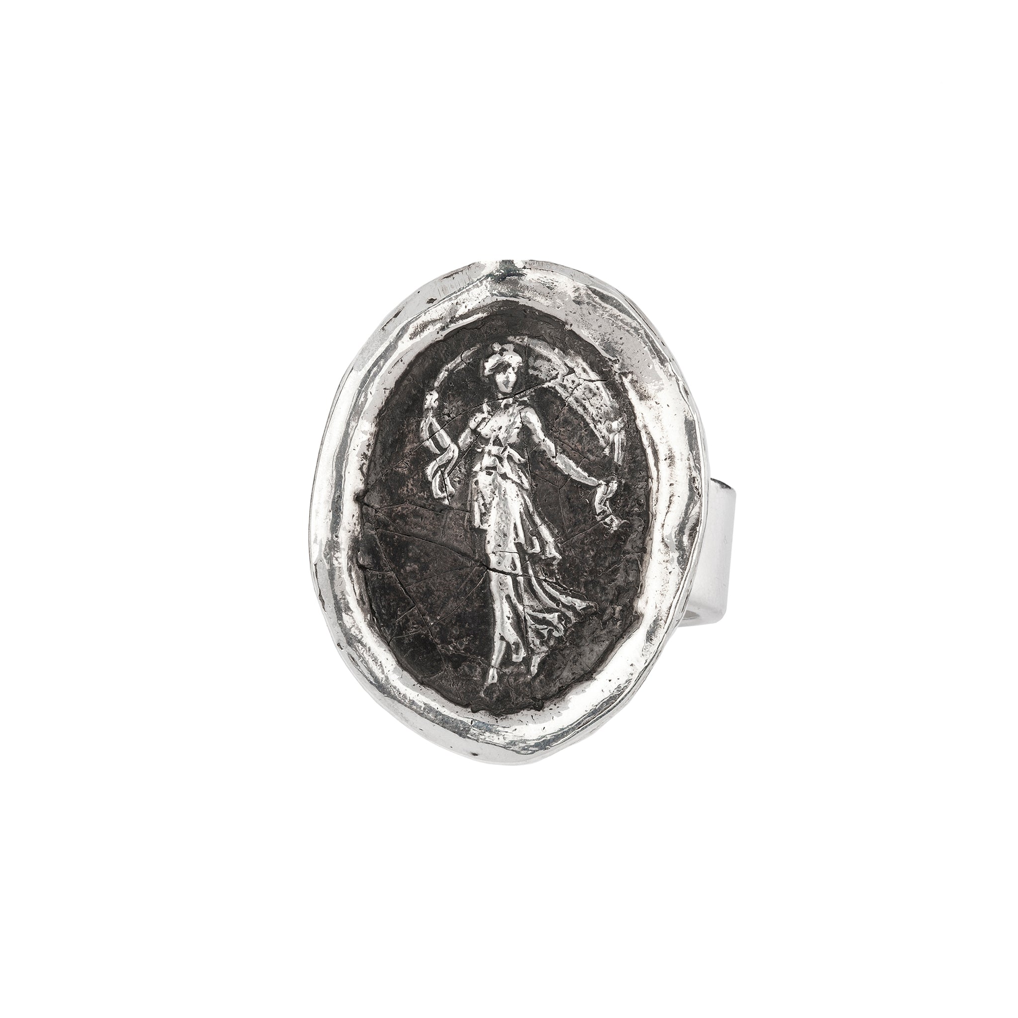 A silver textured band ring with our Festive Spirit talisman on it.