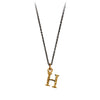 A bronze "H" charm on a blackened sterling silver chain.