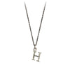A sterling silver letter "H" charm on a silver chain.