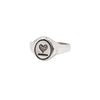 A silver signet ring with our sterling silver Heart oval talisman.