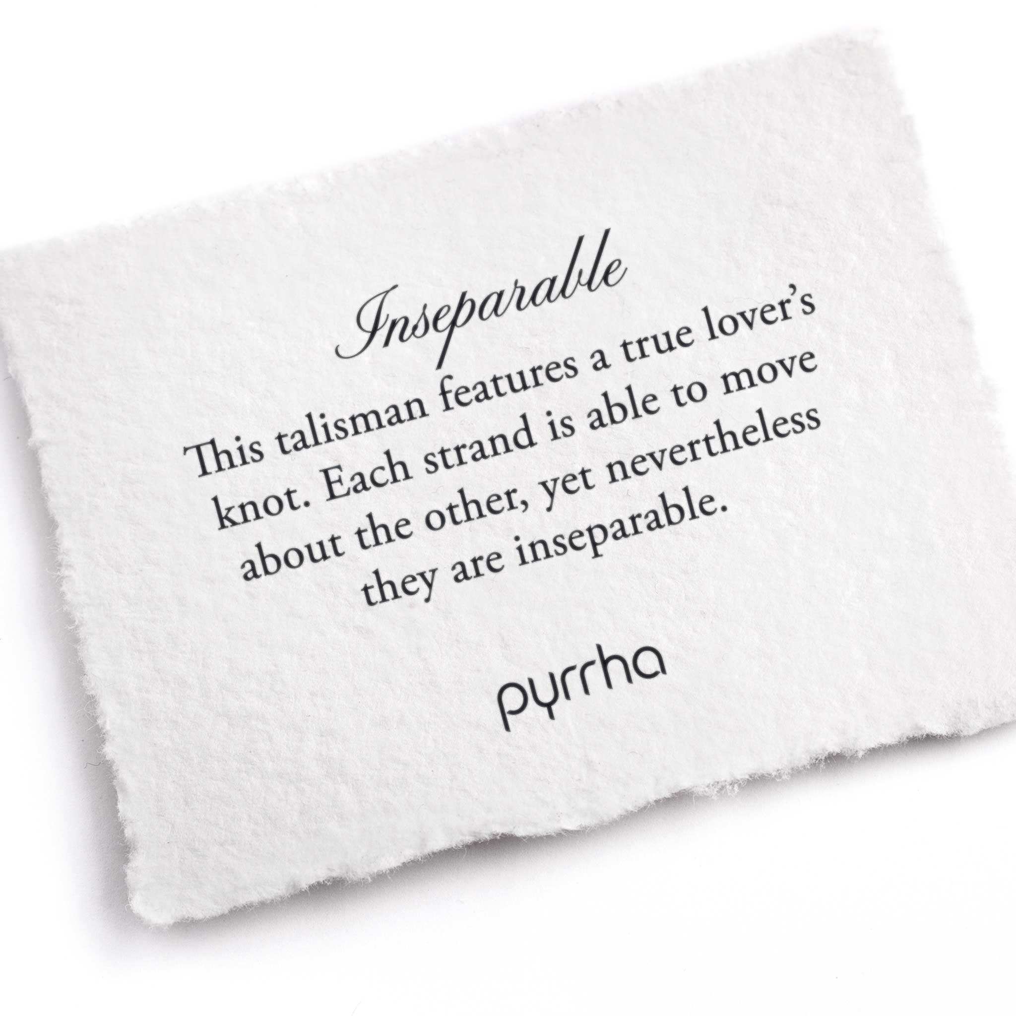 A hand-torn, letterpress printed card describing the meaning for Pyrrha's Inseparable Talisman