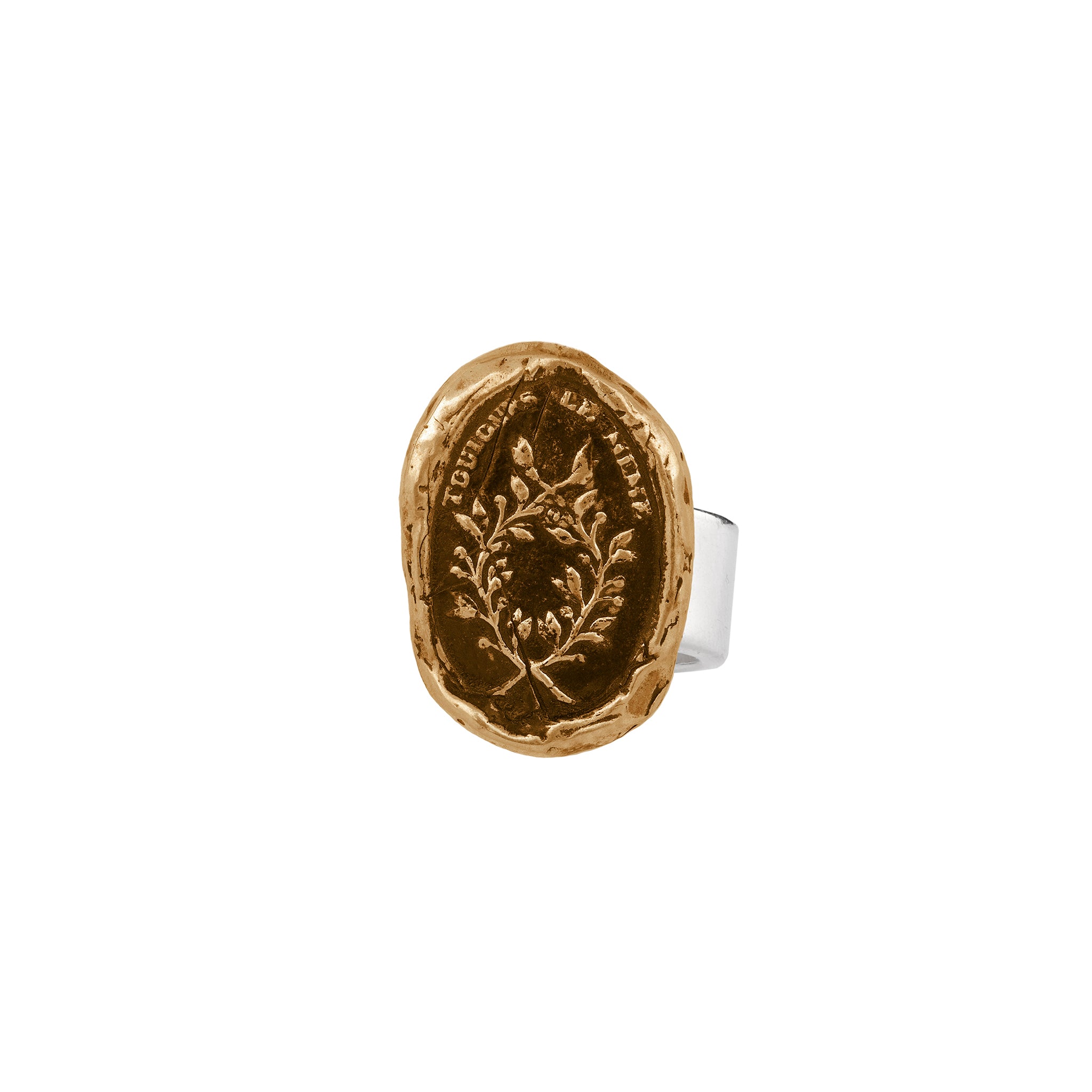 A bronze ring with our Integrity talisman on the band.