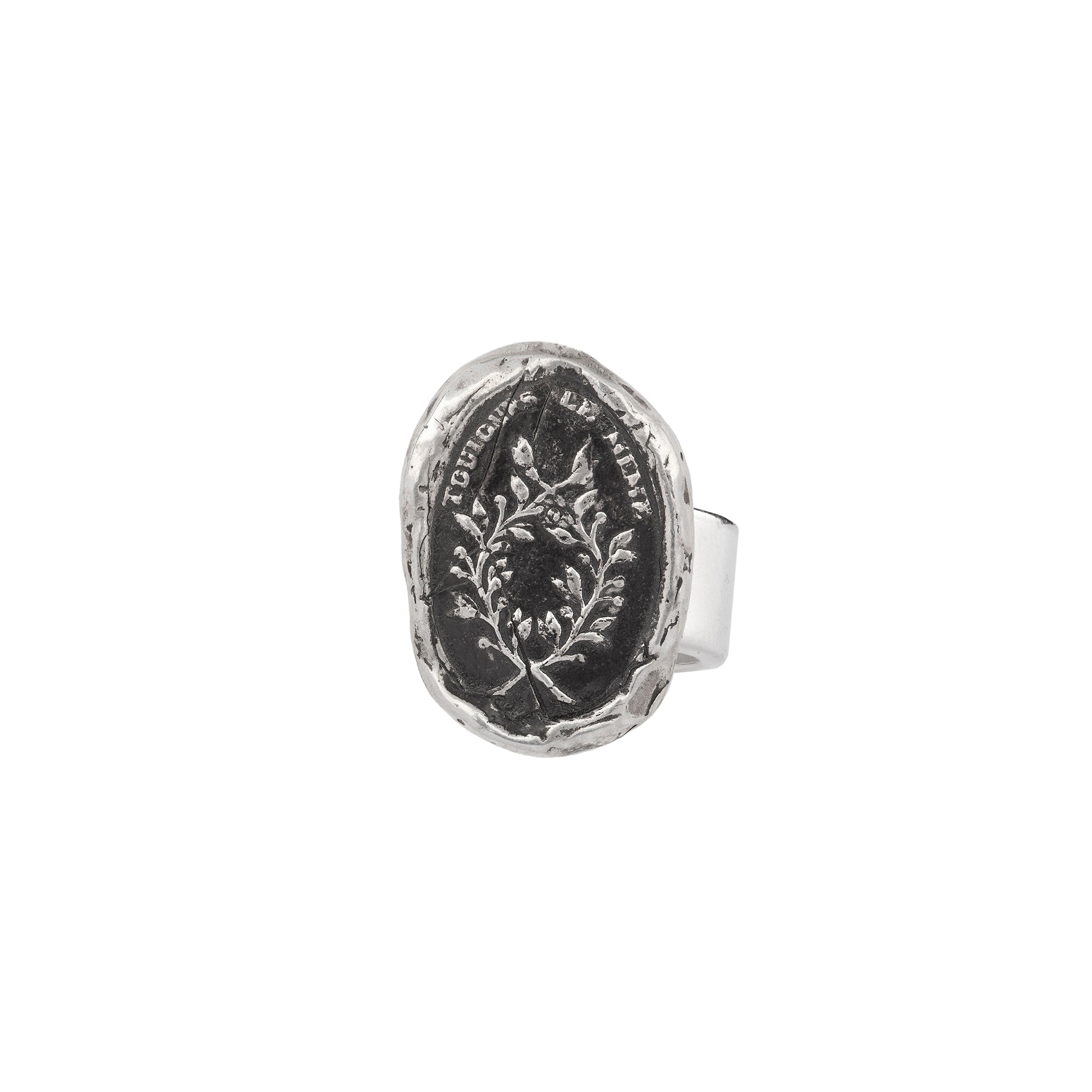 A sterling silver ring with our Integrity talisman on the band.