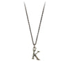 A sterling silver letter "K" charm on a silver chain.