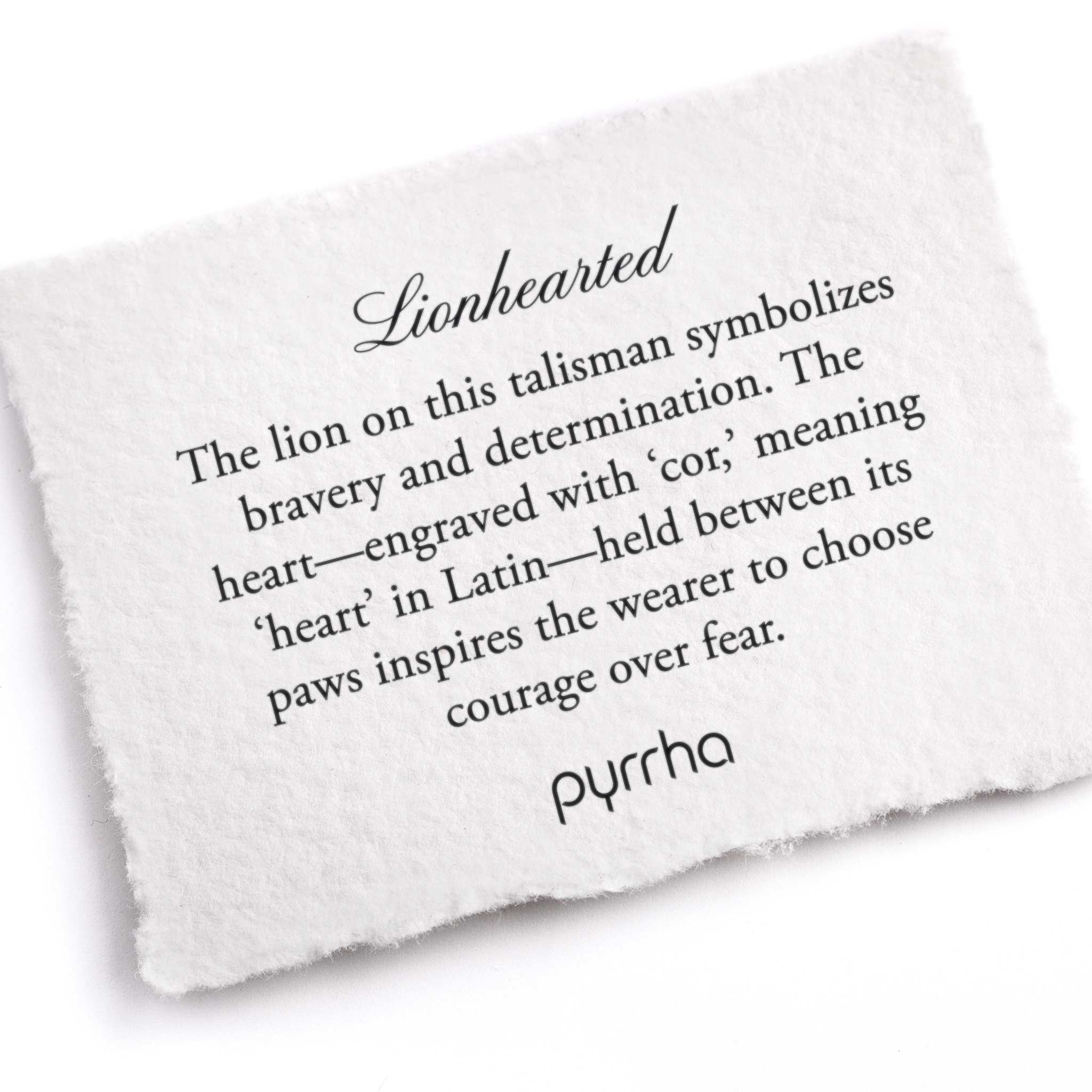 A hand-torn, letterpress printed card describing the meaning for Pyrrha's Lionhearted Talisman