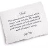 A hand-torn, letterpress printed card describing the meaning for Pyrrha's Luck Signature Talisman Necklace