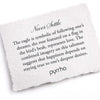 A hand-torn, letterpress printed card describing the meaning for Pyrrha's Never Settle Talisman
