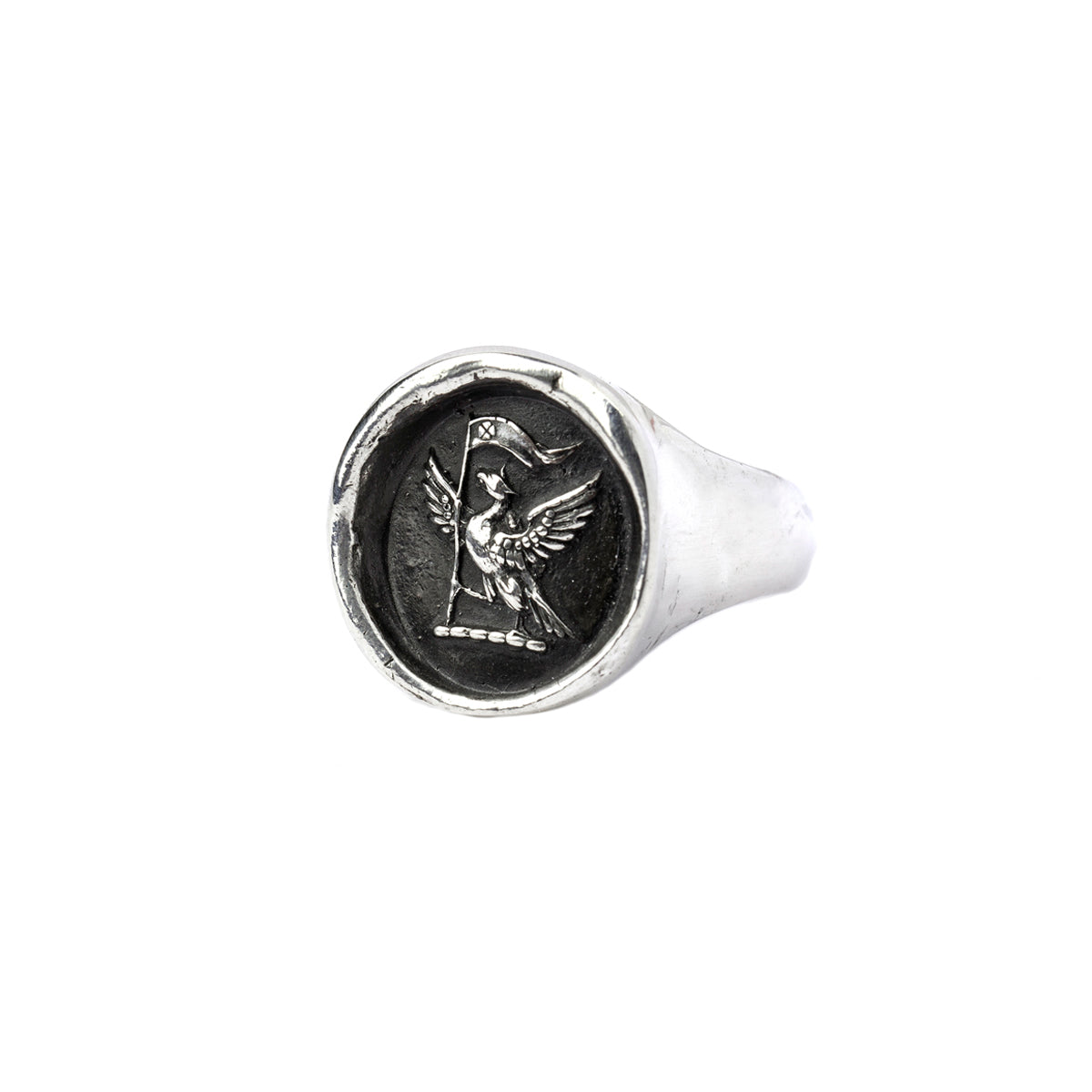 A sterling silver signet ring with our silver Never Settle talisman.