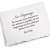 A hand-torn, letterpress printed card describing the meaning for Pyrrha's New Beginnings Talisman Necklace