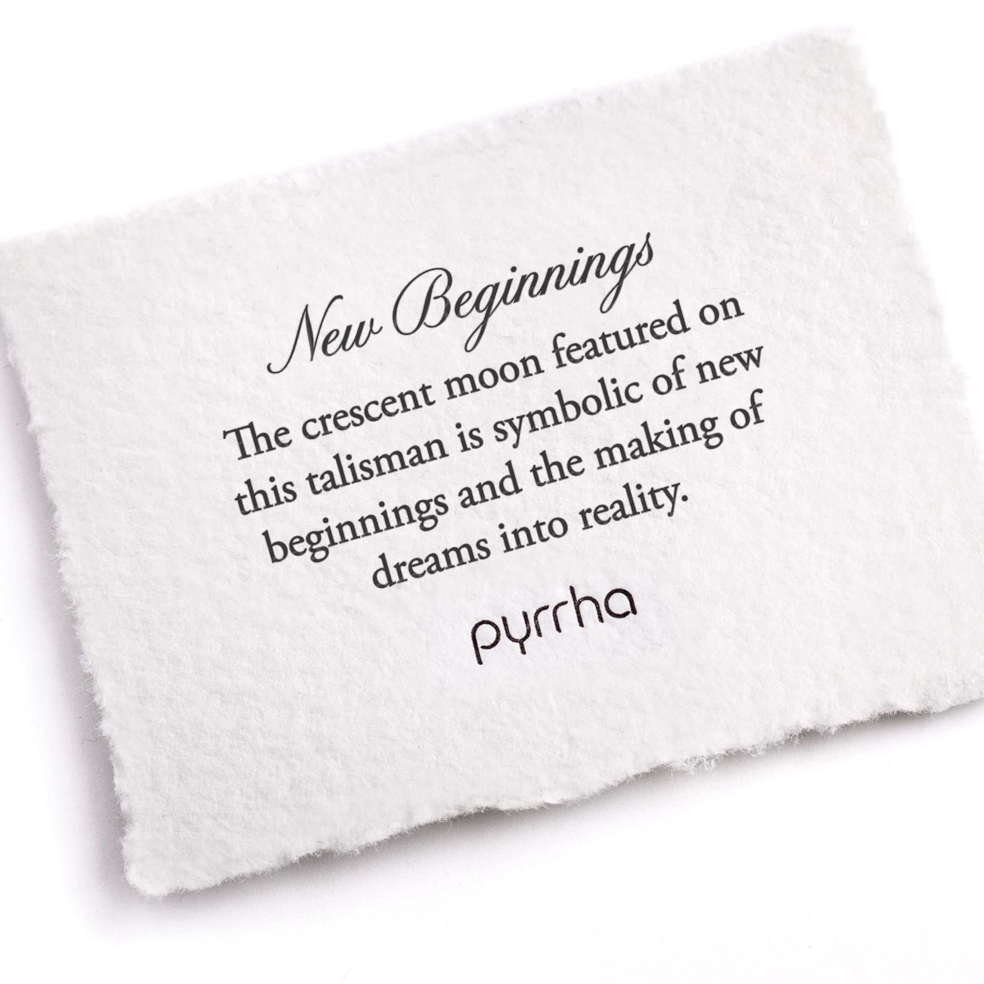 A handtorn cotton card describing the meaning for our New Beginnings Wide Bar Bracelet.