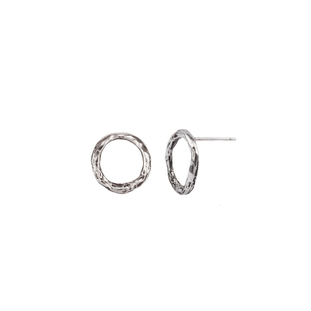 A set of sterling silver extra small open circle studs.