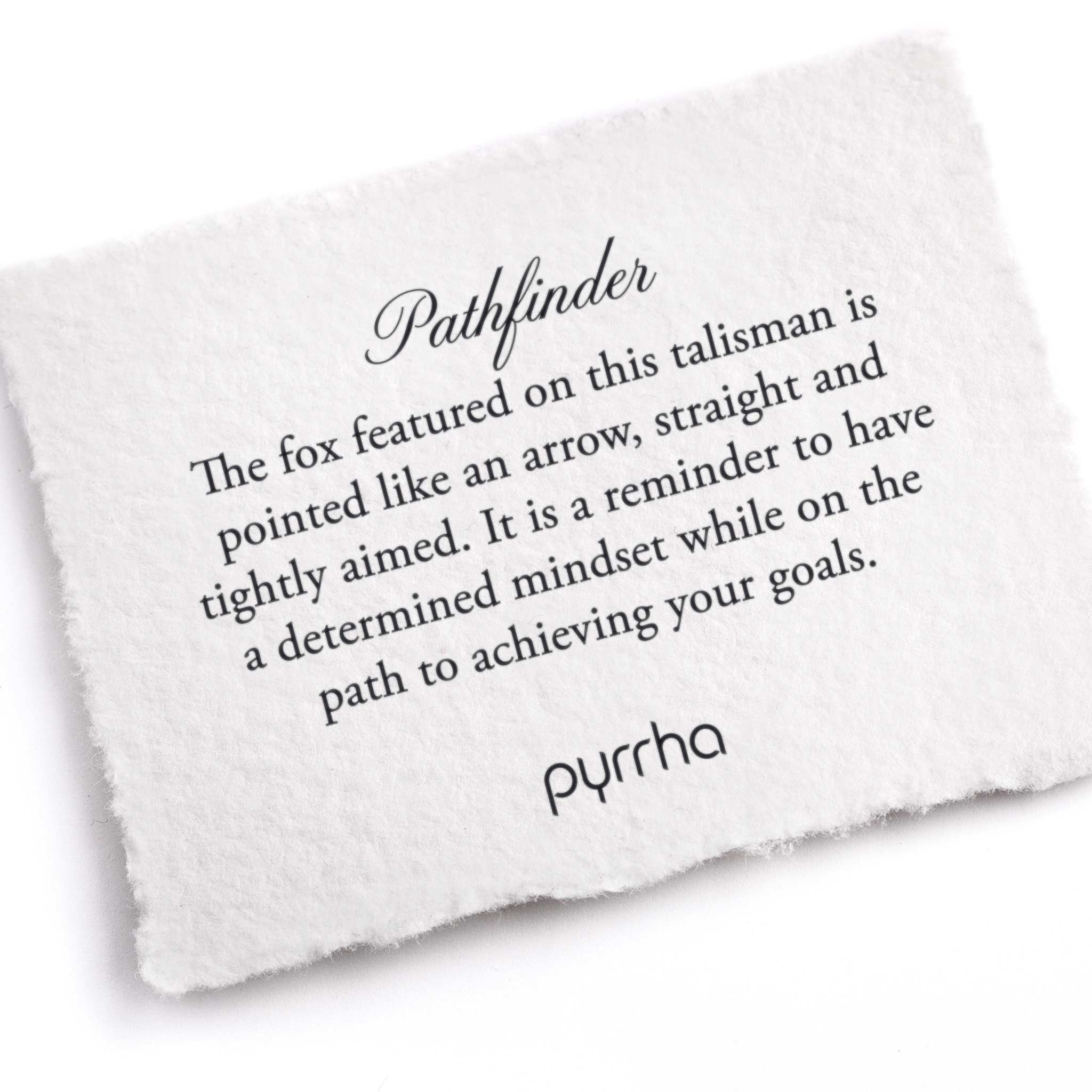 A hand-torn, letterpress printed card describing the meaning for Pyrrha's Pathfinder Talisman