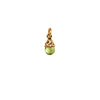 A bronze attraction charm capped with a peridot stone.