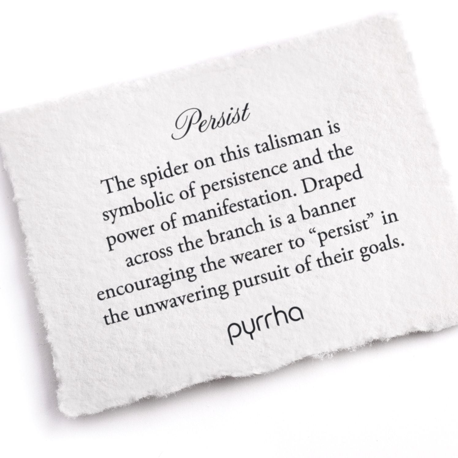 A hand-torn, letterpress printed card describing the meaning for Pyrrha's Persist Talisman