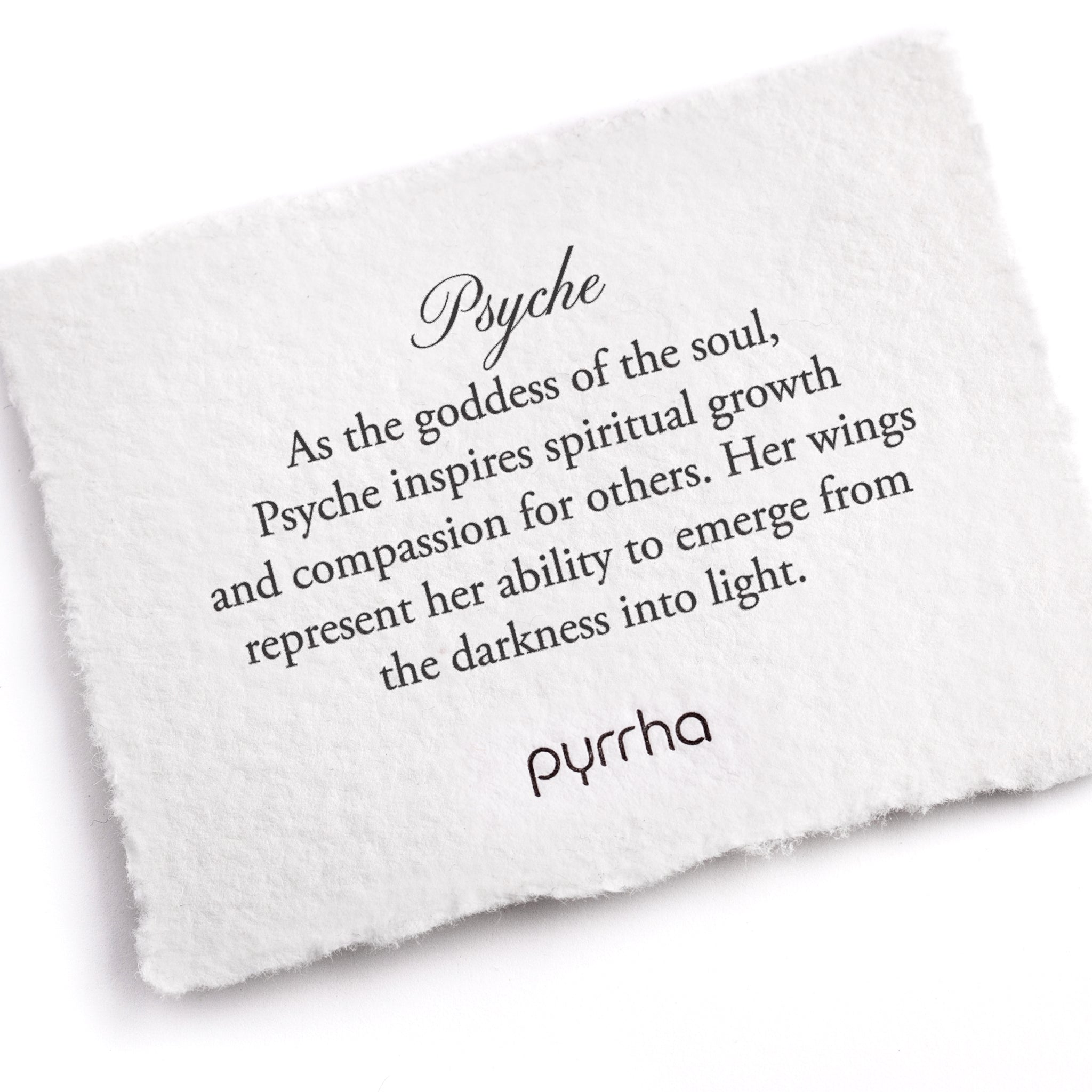 A handtorn cotton card describing the meaning for our Psyche 14K Gold Goddess Talisman.