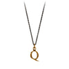 A bronze "Q" charm on a blackened sterling silver chain.